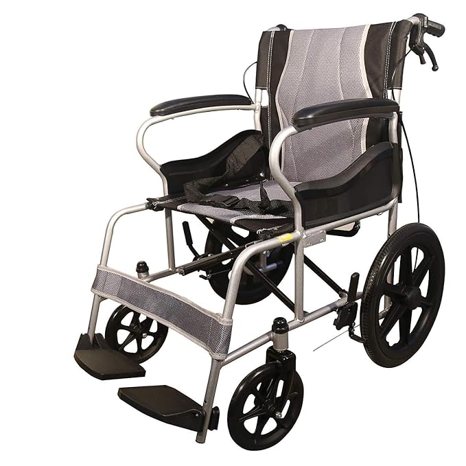 KARMA Ryder Aluminium frame lightweight attendant wheelchair with handbrakes.